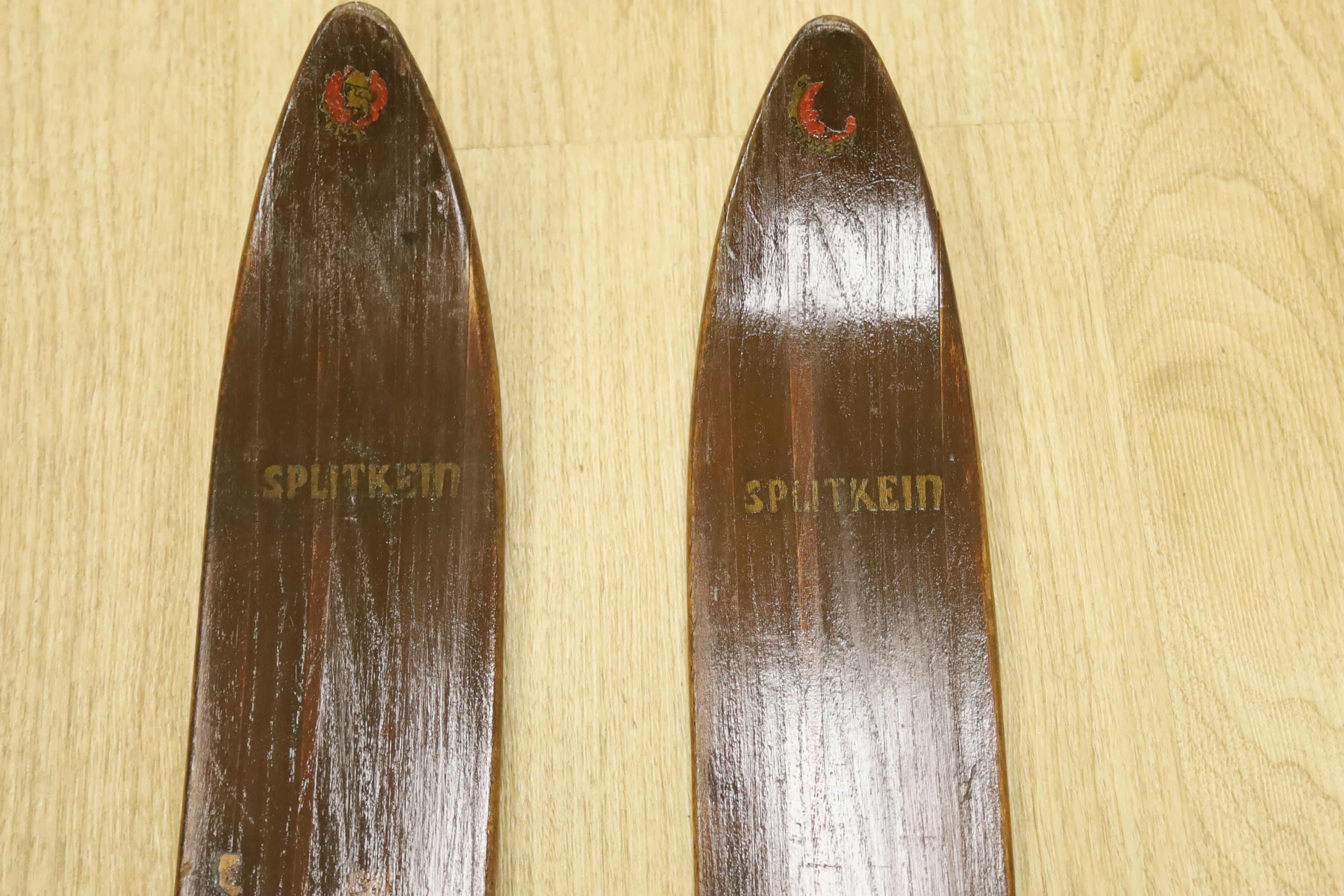 A pair of vintage wood skis, length 210cm